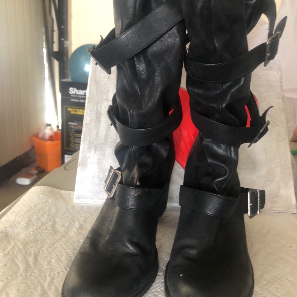 Black suede like mid calf boots.